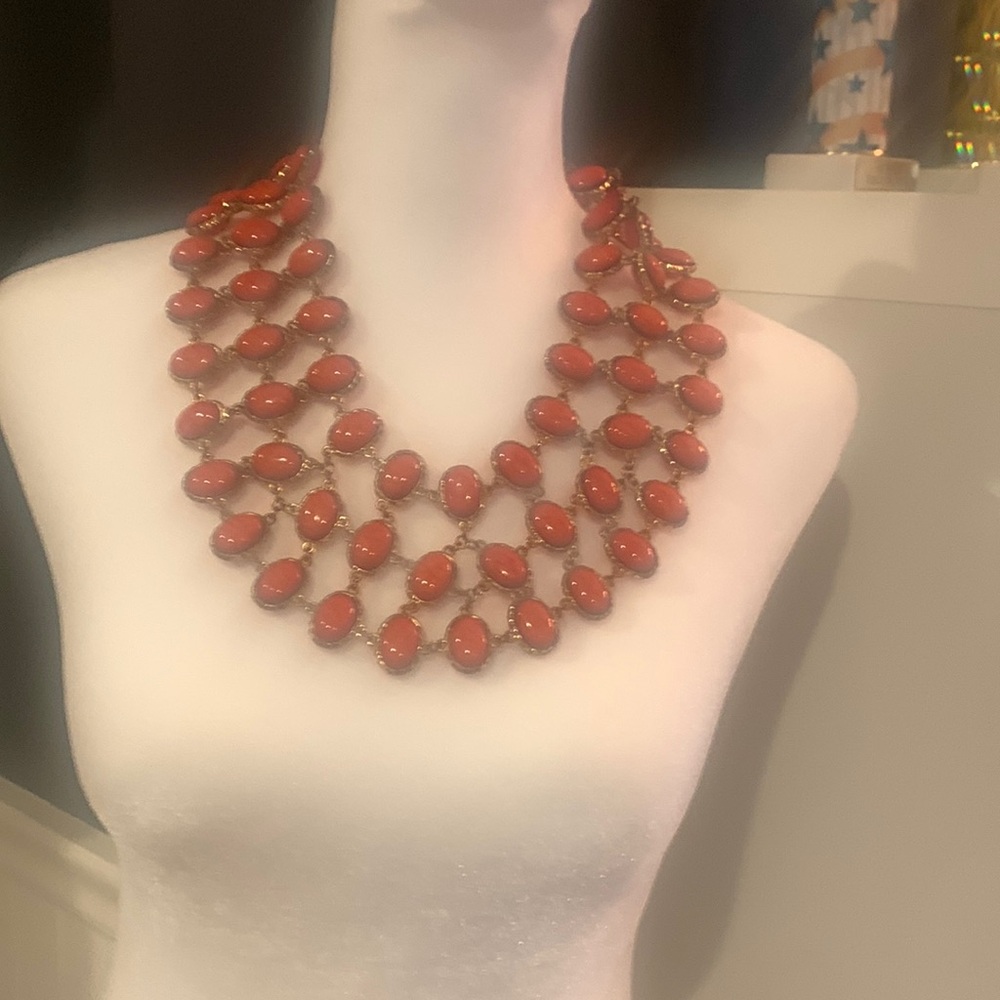 Beautiful beaded necklace.  Reversible orange and pink.